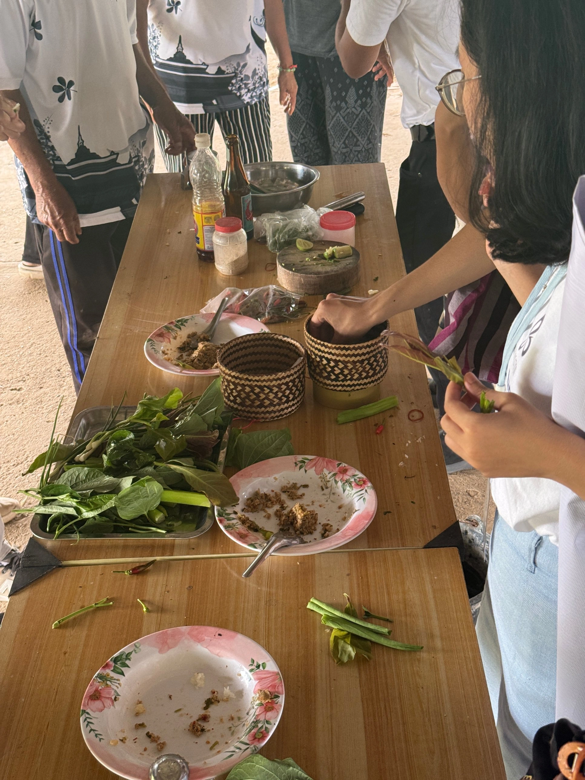 Community food demonstration at a Lawa Model field site